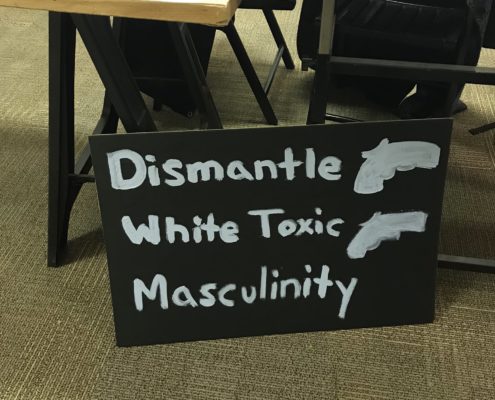 At an event making posters for the March for Our Lives Rally in Washington, DC, 2018. The sign reads "dismantle white toxic masculinity"