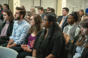 students sitting at a presentation
