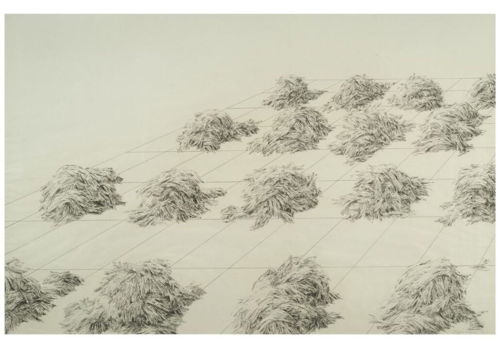 Black and white bales of hay sit on a black gridded formation on a white background.